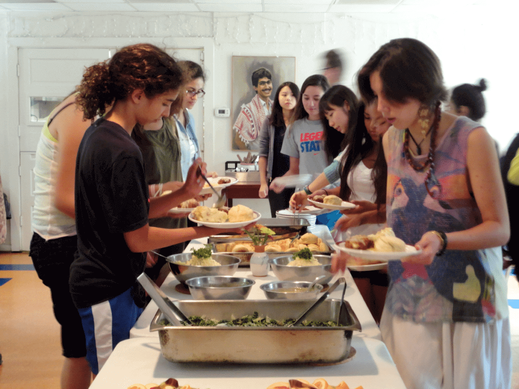 Cabin Paz (thats Spanish for "Peace") line up to enjoy a lunch of LOL Croquettes, hand smashed potatoes, sauteed spinach and homemade biscuits